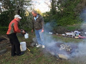 Bradley and Steve start some oysters roasting